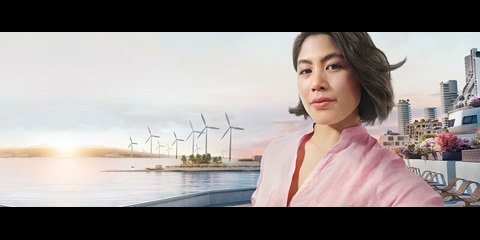 Woman infront of wind turbines