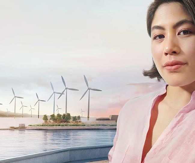 Woman infront of wind turbines